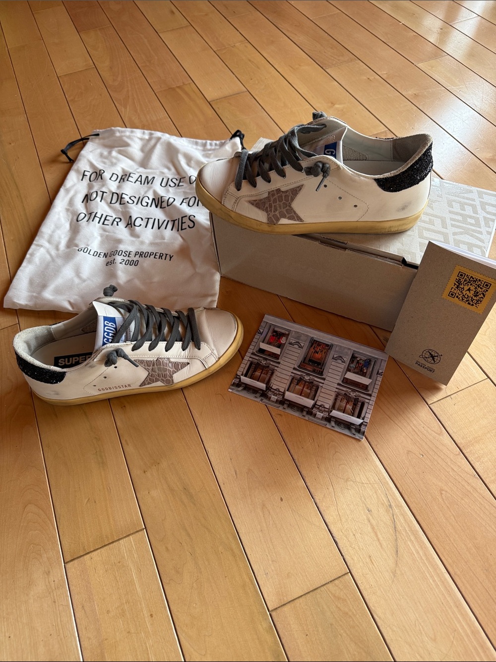Golden Goose Low-Top Sneakers in White with Black Heel and Gray Star